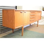 Modern Design - Younger teak sideboard fitted four central drawers flanked by two cupboard doors