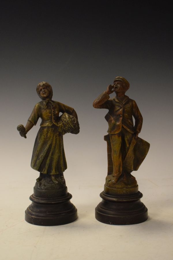 Pair of early 20th Century French bronzed spelter figures, each depicting a street vendor Condition: