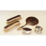 George V silver and tortoiseshell backed three piece brush set, Birmingham 1928, together with two