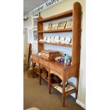 Mid 20th Century oak dresser, the base fitted three carved Celtic knot design drawer fronts above