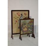 Early 20th Century mahogany framed firescreen, the silkwork panel depicting a peacock perched in a