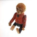 Schuco tin plate and felt monkey, the body concealing a glass scent bottle Condition: