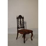 Victorian carved walnut and beech occasional chair having a pierced scroll back splat flanked by