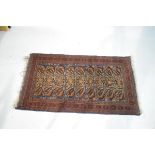 Middle Eastern wool rug having stylised foliate decoration on a blue ground within multi borders