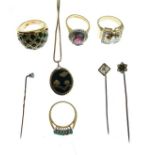 Diamond set stickpin in a square lattice setting, two other stickpins, four dress rings and a