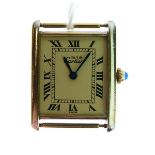 Must de Cartier silver gilt tank quartz wristwatch, the ivory dial having Roman numerals, together