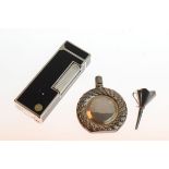 Dunhill gas cigarette lighter and a white metal scent phial Condition:
