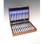 Twelve pairs of Edward VII mother-of-pearl handled engraved silver fruit knives and forks, Sheffield