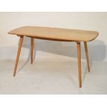 Ercol light elm top rectangular table raised on four beech supports Condition: