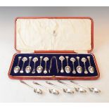 Set of twelve George V silver Trefid pattern coffee spoons with matching tongs, Sheffield 1925,