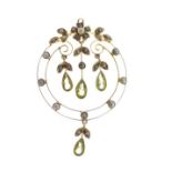 Early 20th Century circular pendant set seed pearls and three tear drop peridot coloured stones