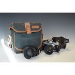 Olympus OM-1 camera with two lenses and a carry case Condition: