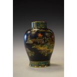 Carlton Ware baluster shaped vase decorated with a chinoiserie lakeland landscape on a black