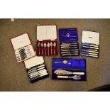 Quantity of various silver plated tea knives, etc, one set having silver handles Condition: