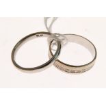 9ct white gold wedding band having band of engraved decoration, together with one other wedding