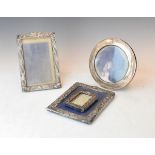 Four early 20th Century silver picture frames Condition: