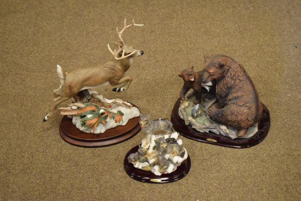 Franklin Mint porcelain 10 point buck and a resin figure group of a bear cub with mother and one