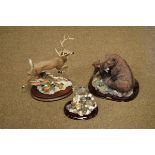 Franklin Mint porcelain 10 point buck and a resin figure group of a bear cub with mother and one