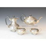 George V silver four piece tea set, each piece decorated with a bell husk band, 51oz approx gross
