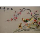 Three Chinese embroidered pictures - Birds amongst foliage, 25cm x 35cm and 35cm x 25cm, all