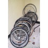Quantity of mountain bike and racing cycle wheels, some with tyres Condition: