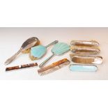 George V silver and pale blue enamel three piece brush set, Birmingham 1938, together with an