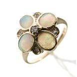 9ct gold opal and white stone dress ring in a flower design setting, size K Condition:
