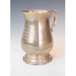 Elizabeth II silver baluster shaped tankard having an acanthus scroll handle and standing on a