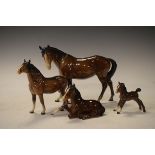 Four Beswick figures of brown horses No's 915,976,997 and1197 Condition: