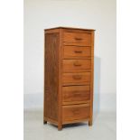 Early 20th Century light oak slender chest of six drawers Condition: