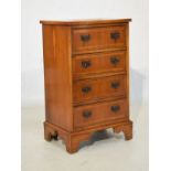 Reproduction yew finish four drawer chest Condition: