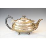 George V silver teapot having a gadrooned edge and standing on ball feet, Sheffield 1926, 22.1oz