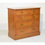Edwardian oak chest of two short and three long drawers, standing on a plinth base Condition: