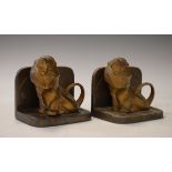 Pair of Art Deco design partially gilded spelter bookends, each formed as a seated lion Condition: