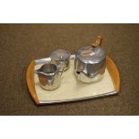 Picquot ware three piece aluminium tea set and matching tray Condition: