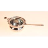 Elizabeth II silver tea strainer and stand, Birmingham 1976, 1.8oz approx Condition: