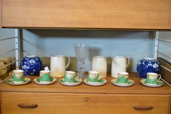 Three Keith Murray for Wedgwood ivory coloured tankards together with a pair of blue and white