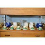 Three Keith Murray for Wedgwood ivory coloured tankards together with a pair of blue and white