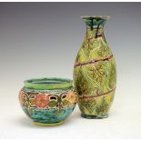 Della Robbia Pottery slender ovoid vase decorated with stylised trailing leaves on a yellow