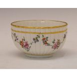 18th Century Bristol porcelain bowl decorated with polychrome foliate swags and gilt bands, the