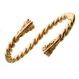 Torc bangle, unmarked, of barley twist design with decorative terminals, 61g gross Condition: Bangle