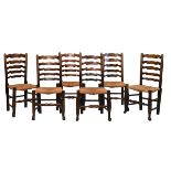 Matched set of six 19th Century ash and oak ladder back dining chairs, each having a rush seat and