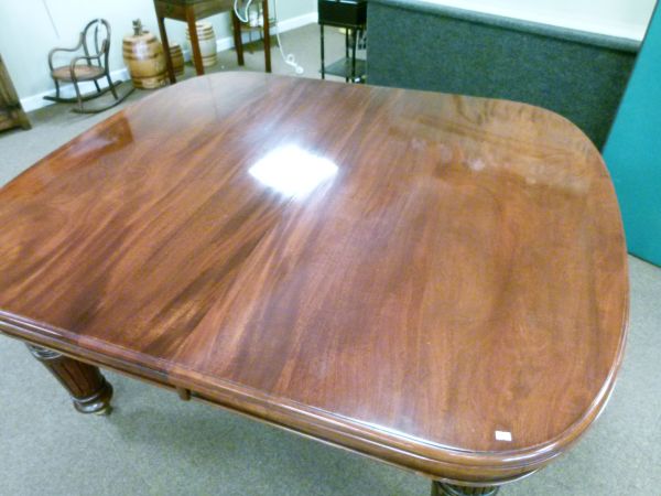 Late Victorian walnut rectangular extending dining table fitted three insertions and standing on - Image 2 of 9