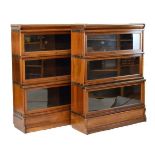 Pair of early 20th Century Globe Wernicke mahogany three tier sectional bookcases, each fitted up-