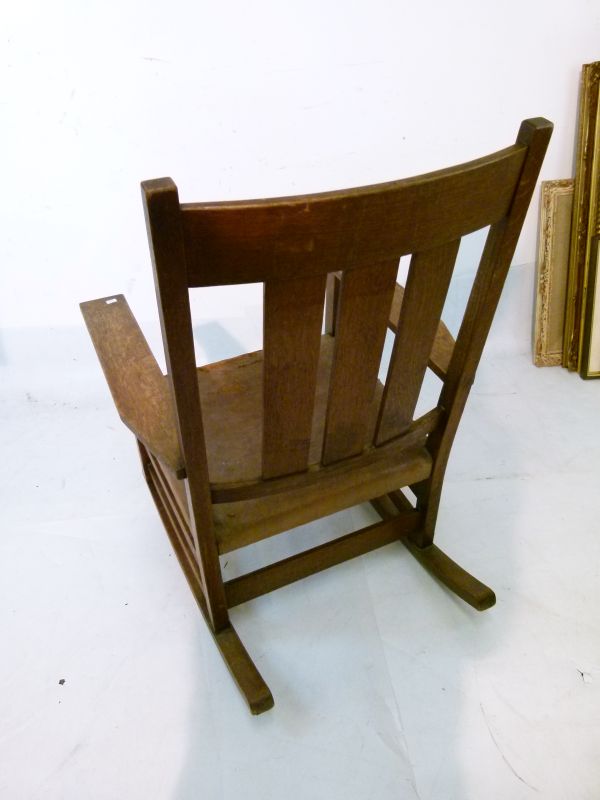 Gustav Stickley oak ladder back rocking chair having a triple lath back, wide flat arms, stuffed - Image 4 of 7