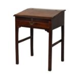 George III mahogany desk having a hinged slope, one long drawer below and standing on square moulded