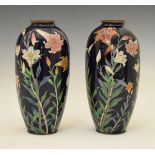 Pair of Japanese cloisonné ovoid vases, Meiji period, each decorated with stylised lilies on a