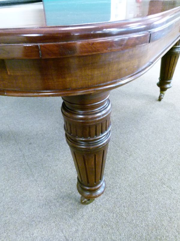 Late Victorian walnut rectangular extending dining table fitted three insertions and standing on - Image 4 of 9