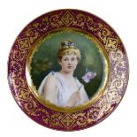 Vienna porcelain cabinet plate having central painted decoration depicting a young lady holding a