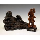 Chinese carved hardwood figure group depicting Liu Hai and the toad, each having glass eyes and on a